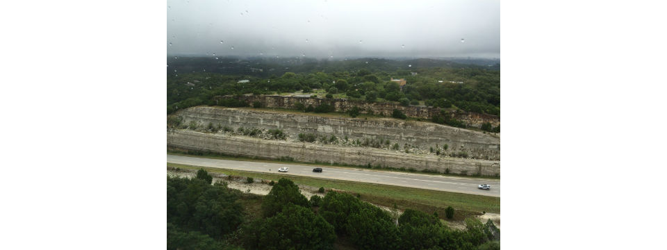 >Image credit: Rainswept vista of Austin, Texas, from Dimensional Fund Advisors' headquarters (Jason Zweig, 2016)